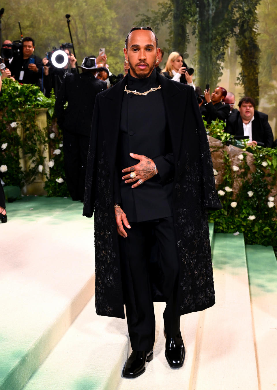 Lewis Hamilton at the 2024 Met Gala in a suit with a long jacket