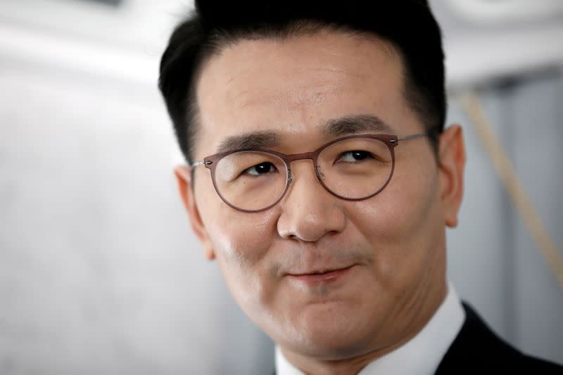 FILE PHOTO: Korean Airlines' CEO Cho Won-tae answers a reporters' question inside a B787-9 belonging to Korean Airlines at its aviation shed in Incheon