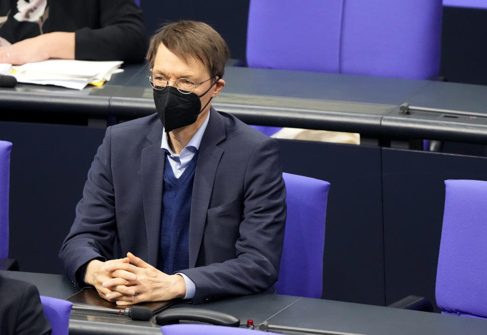 German Health Minister Karl Lauterbach attends a debate about a vaccination mandate at the parliament Bundestag in Berlin, Germany, Wednesday, Jan. 26, 2022. (AP Photo/Markus Schreiber)