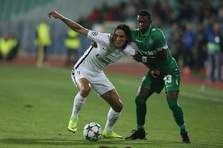 Football Soccer - Ludogorets v Paris Saint-Germain - UEFA Champions League group stage - Group A - Vassil Levski stadium, Sofia, Bulgaria - 28/09/16 - Paris Saint-Germain's Edinson Cavani and Ludogorets' Virgil Misidjan in action. REUTERS/Stoyan Nenov