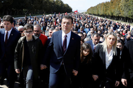 Ekrem Imamoglu, main opposition Republican People's Party (CHP) candidate for mayor of Istanbul, visits Anitkabir, the mausoleum of modern Turkey's founder Mustafa Kemal Ataturk, as he is flanked by his family members and supporters in Ankara, Turkey, April 2, 2019. REUTERS/Umit Bektas/File Photo