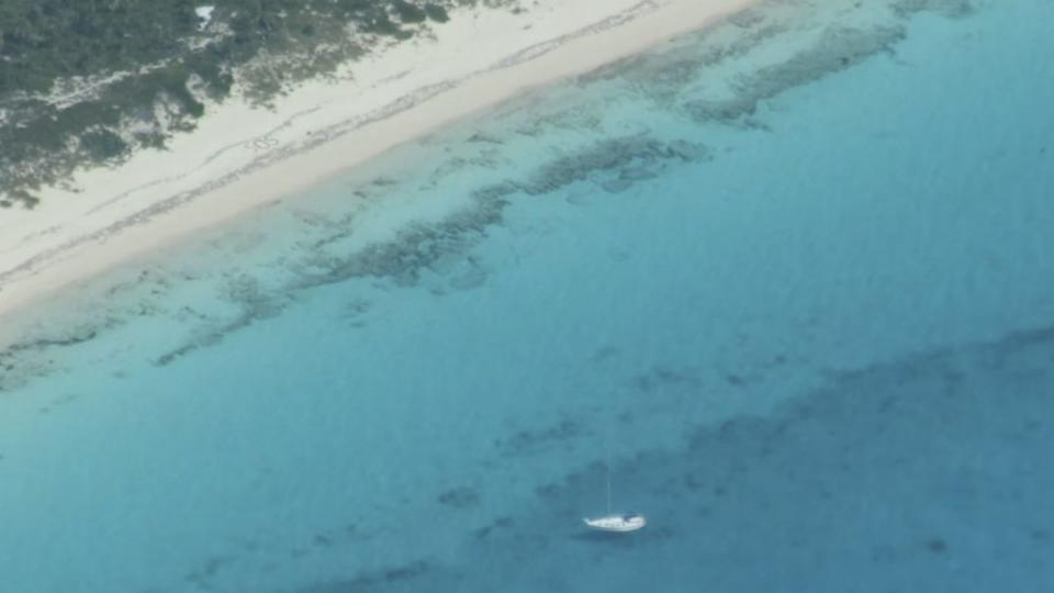 PHOTO: 'S.O.S.' is written on a beach in Cay Sal, Bahamas, in an undated photo released by the U.S. Coast Guard on Aug. 18, 2023. (U.S. Coast Guard)