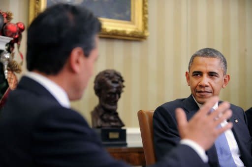 US President Barack Obama listens to President-elect Enrique Pena Nieto of Mexico during a bilateral meeting in the Oval Office at the White House in Washington. Obama noted the "ambitious" reform agenda of Mexico's president-elect Enrique Pena Nieto, as he welcomed him to the White House four days ahead of his inauguration