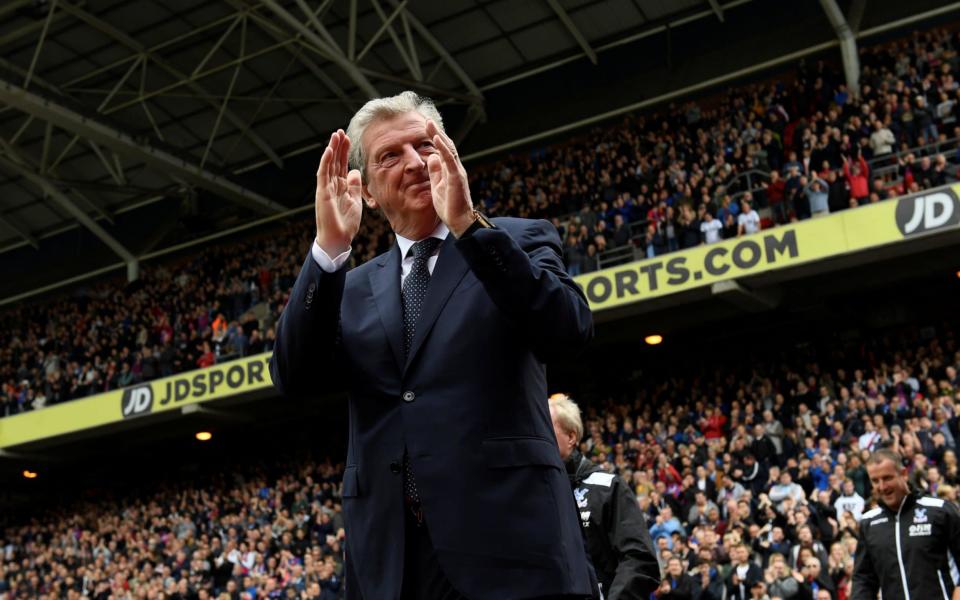 <p>Roy Hodgson applauds the fans at Selhurst Park before kick off. </p>