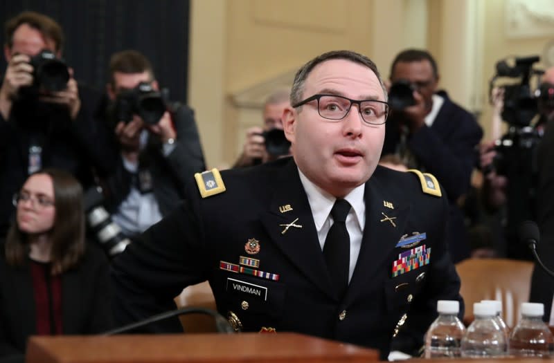 NSC official Vindman arrives ahead of his testimony before a House Intelligence Committee hearing as part of the impeachment inquiry into U.S. President Donald Trump on Capitol Hill in Washington