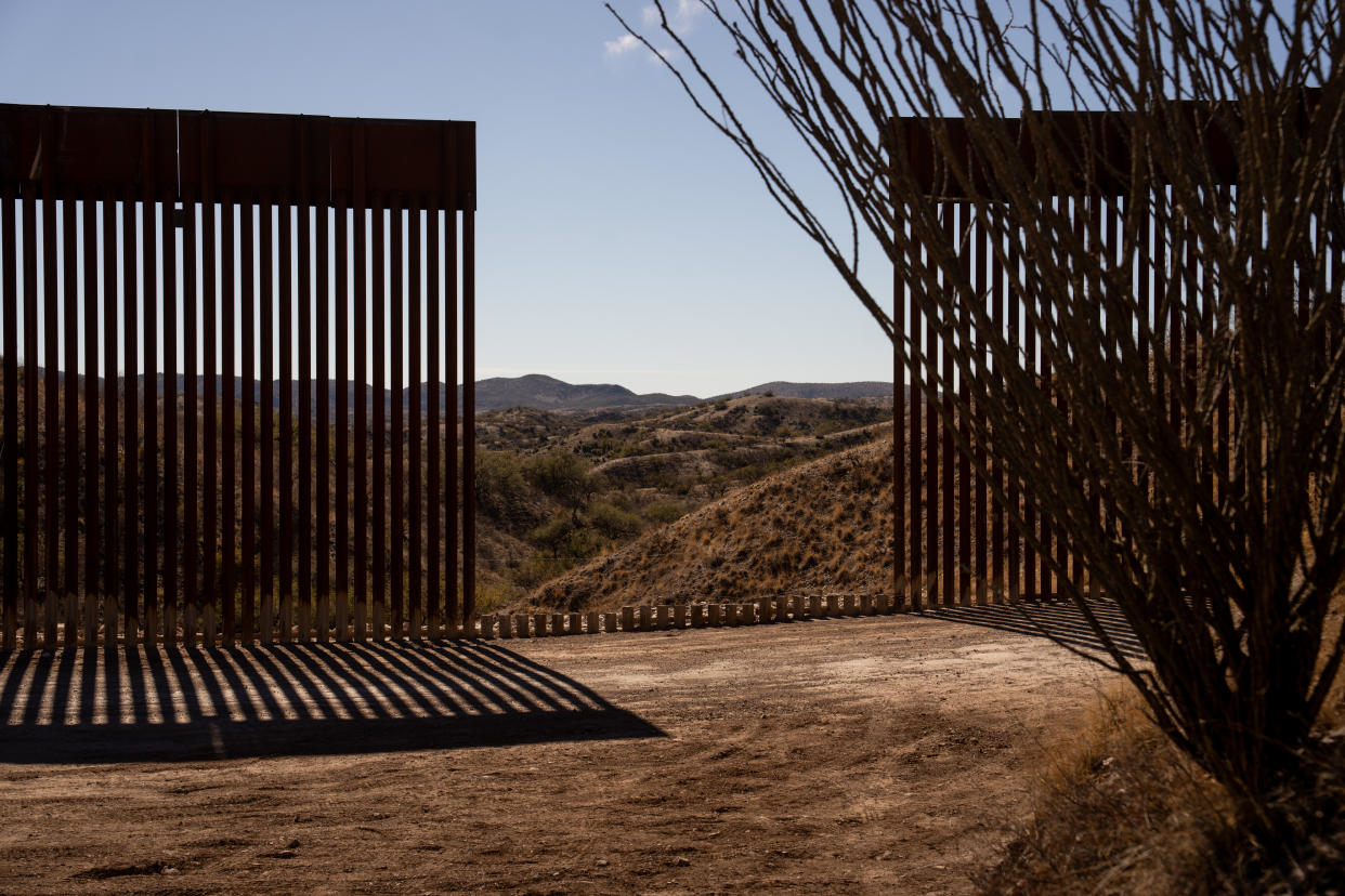 A gap in the border wall where a construction crew had to take down a section of the wall to repair erosion on the Mexican side of the wall outside of Arivaca, Ariz., on Jan.  14, 2024. (Erin Schaff/The New York Times)