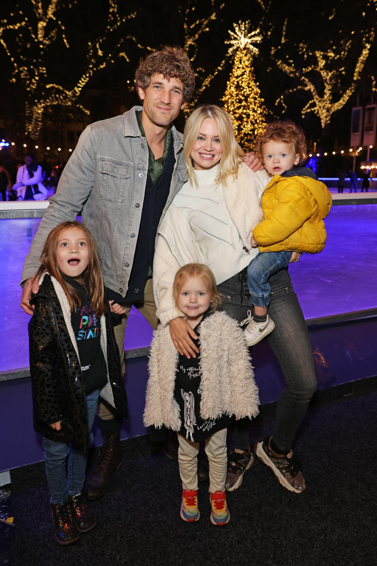 LONDON, ENGLAND - OCTOBER 21:  Max Rogers and Kimberly Wyatt pose with children Willow, Maple and Ford at the VIP launch of the Natural History Museum Ice Rink on October 21, 2021 in London, England. (Photo by David M. Benett/Dave Benett/Getty Images)