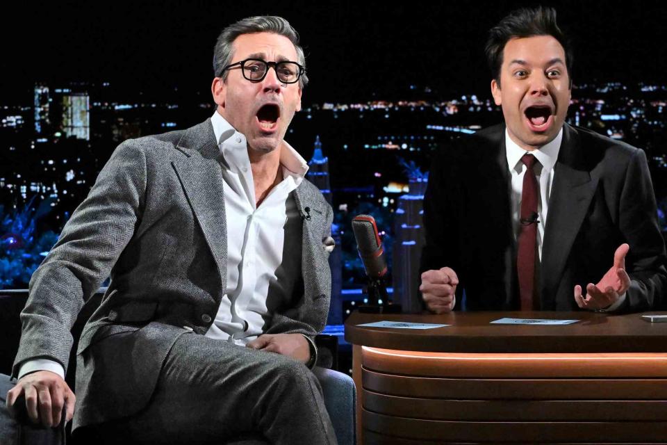 <p>Todd Owyoung/NBC via Getty</p> Jon Hamm and Jimmy Fallon dramatically read the lyrics to Christmas carols on 