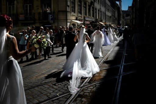 The multiple wedding ceremony is followed by a giant parade