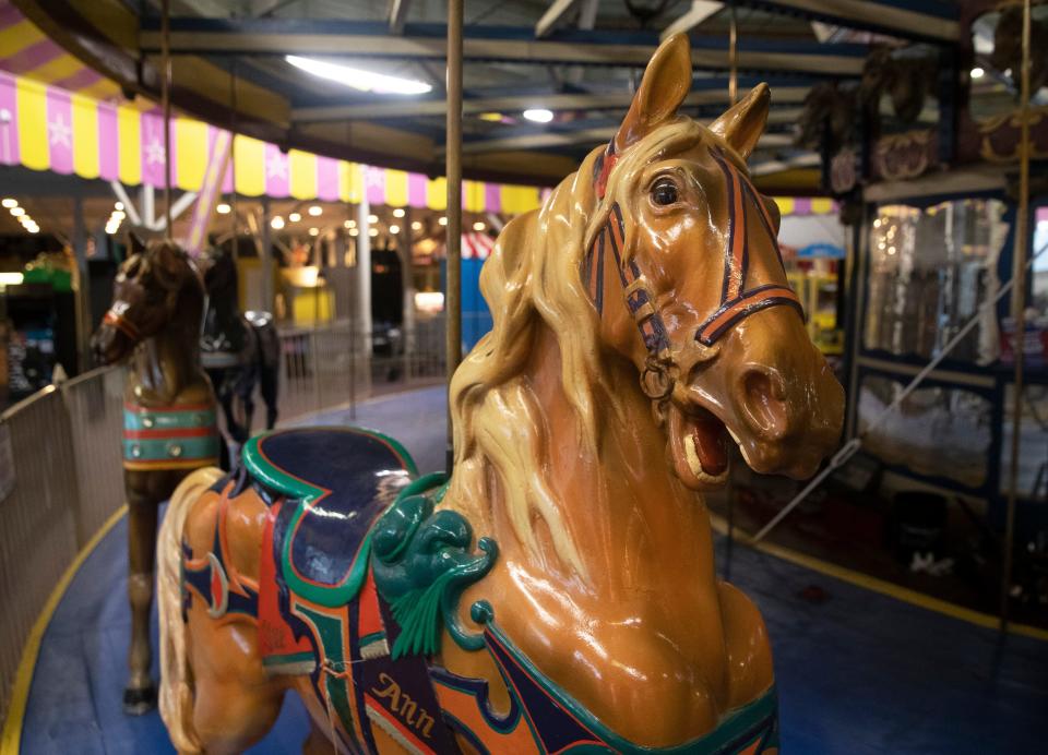 Workers from Carousels and Carvings of Marion, Ohio dismantle the Seaside Heights carousel to put it in storage before it is shipped away for refurbishing. Officials hope to have a new home for it to be reassembled when it has been restored. 