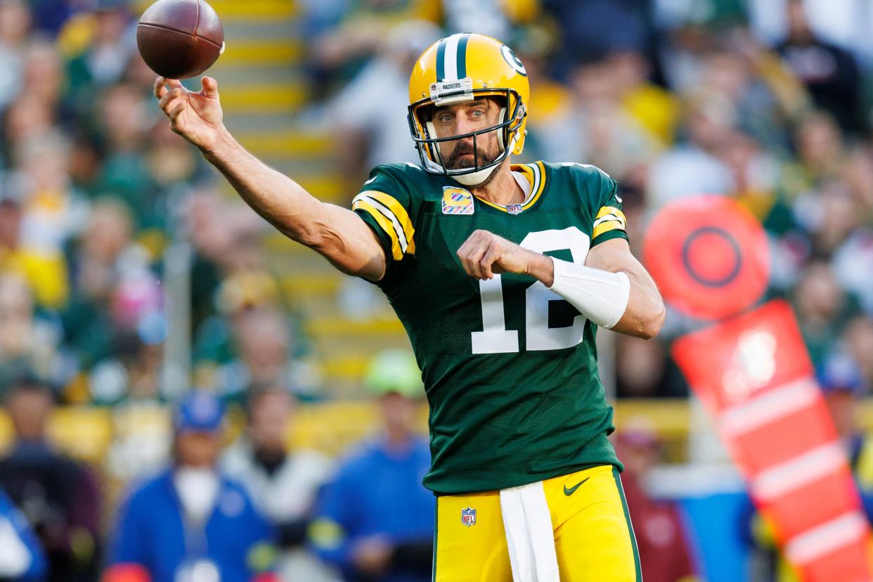 Oct 2, 2022; Green Bay, Wisconsin, USA;  Green Bay Packers quarterback Aaron Rodgers (12) during the game against the New England Patriots at Lambeau Field. Mandatory Credit: Jeff Hanisch-USA TODAY Sports