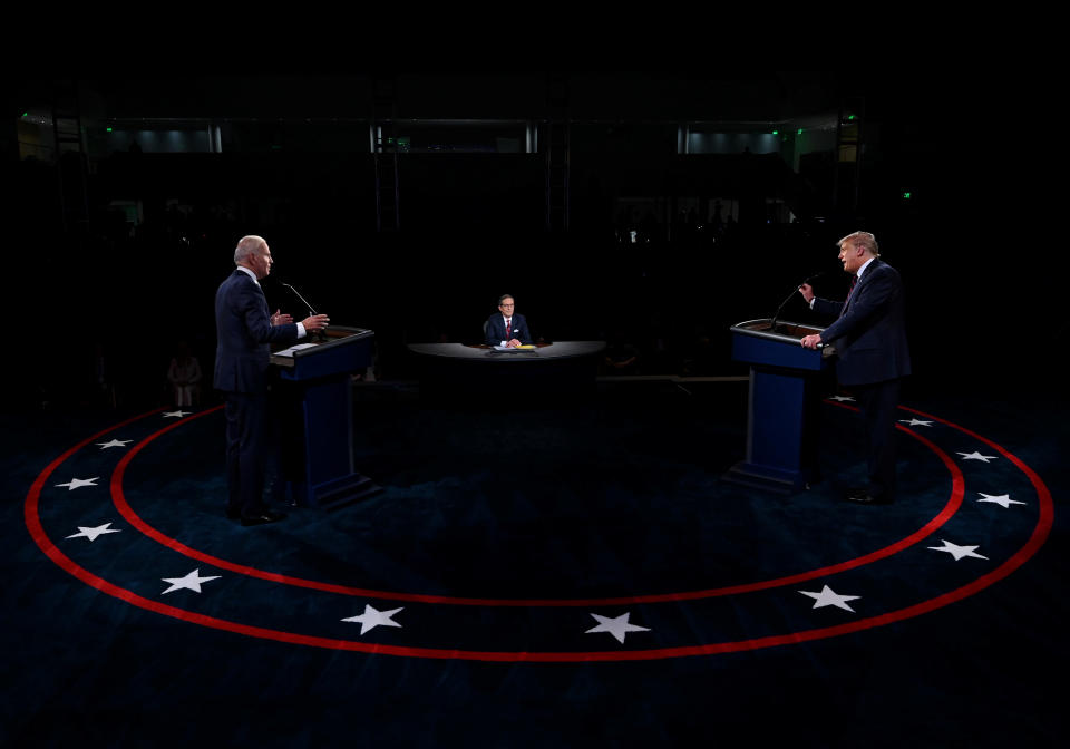 U.S. President Donald Trump and Democratic presidential candidate, former Vice President Joe Biden participate in the first presidential debate at Case Western University and Cleveland Clinic, in Cleveland, Ohio, U.S., September 29, 2020. Picture taken September 29, 2020. Olivier Douliery/Pool via REUTERS