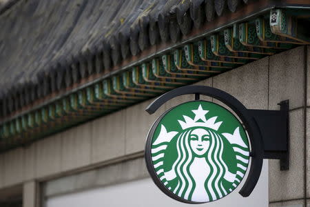 A Starbucks logo is seen at a Starbucks coffee shop in Seoul, South Korea, March 7, 2016. Picture taken March 7, 2016. REUTERS/Kim Hong-Ji
