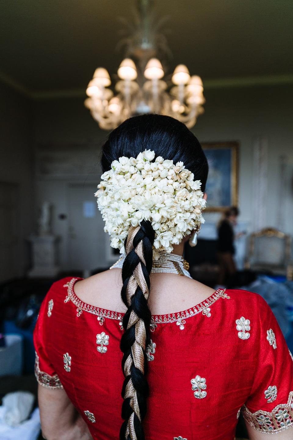I knew I wanted my hair in a long braid for the Indian ceremony Friday night, but it was Prabal Gurung who suggested surrounding the base in jasmine. My hair took a couple of hours to do, but it was so worth it—the flowers were amazingly fragrant.