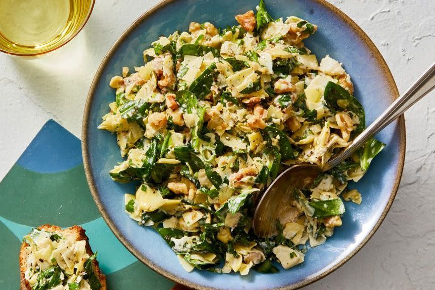 <p>Lighter than your usual gooey, cheesy go-to, this fresh appetizer is the best way to tee up a Thanksgiving feast.</p><p>Get the <a href="https://www.goodhousekeeping.com/food-recipes/a28497576/best-ever-spinach-and-artichoke-dip-recipe/" rel="nofollow noopener" target="_blank" data-ylk="slk:Spinach and Artichoke Dip recipe;elm:context_link;itc:0;sec:content-canvas" class="link "><strong>Spinach and Artichoke Dip recipe</strong></a>.</p>