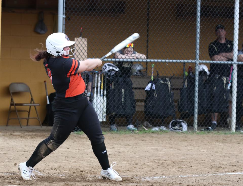 Strasburg's Emma Gilkerson makes solid contact against Central Catholic.