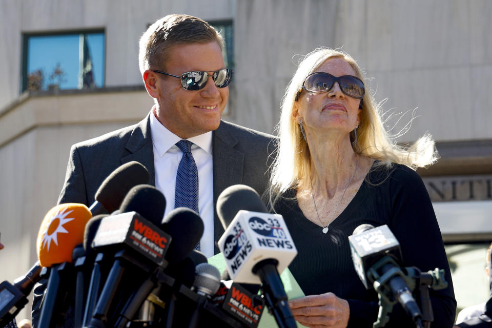 Beth Holloway speaks to media with her son Matt Holloway after the appearance of Joran van der Sloot outside the Hugo L. Black Federal Courthouse Wednesday, Oct. 18, 2023, in Birmingham, Ala. Van der Sloot, the chief suspect in Natalee Holloway’s 2005 disappearance in Aruba admitted he killed her and disposed of her remains, and has agreed to plead guilty to charges he tried to extort money from the teen's mother years later, a U.S. judge said Wednesday. (AP Photo/ Butch Dill )