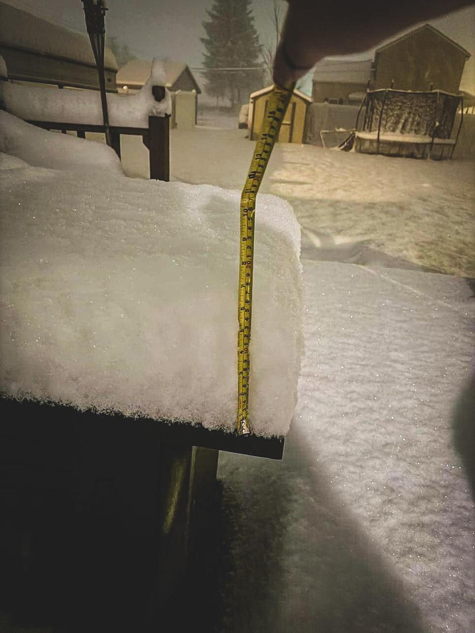 A snowfall measurement Friday night in Newcomerstown.