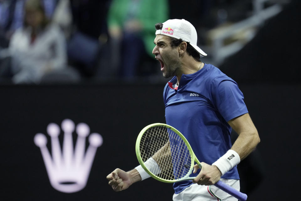 Team Europe's Matteo Berrettini, of Italy, celebrates after winning a match against Team World's Felix Auger-Aliassime, of Canada, on second day of the Laver Cup tennis tournament at the O2 in London, Saturday, Sept. 24, 2022. (AP Photo/Kin Cheung)