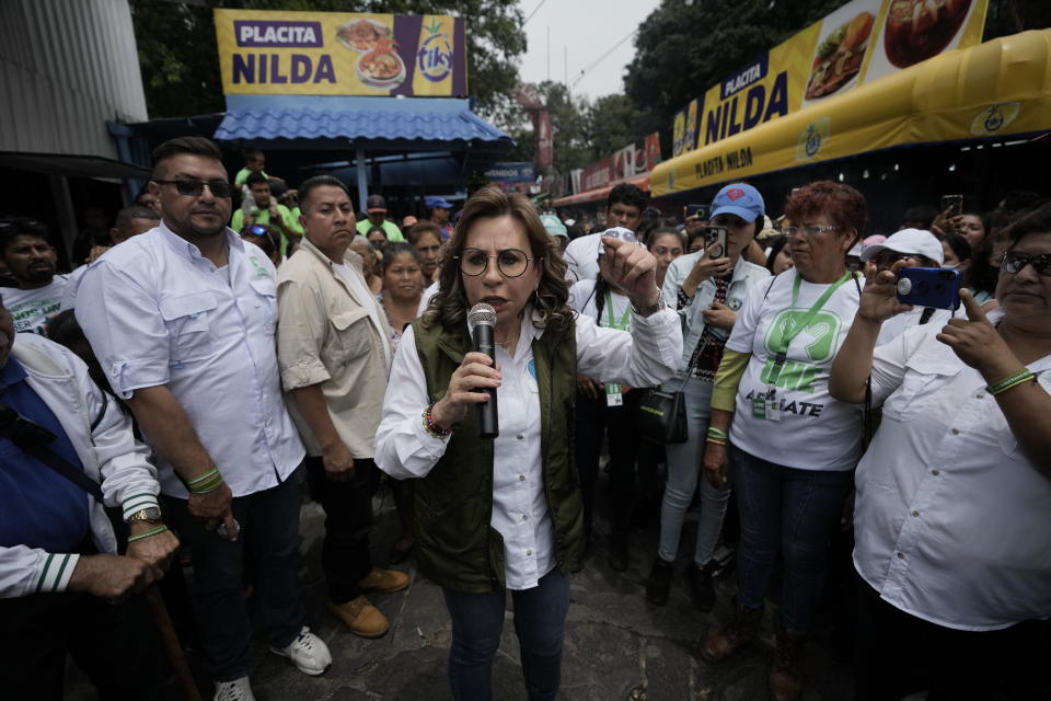 FILE - Sandra Torres, presidential candidate of the National Unity of Hope party, UNE, speaks during a campaign rally in Amatitlán, Guatemala, Sunday, May 14, 2023. Torres announced her platform to cheering supporters at a hotel in May, saying she'd implement the strategies of El Salvador's President Nayib Bukele "to end the scourge of homicides, murders and extortions in our country." (AP Photo/Moises Castillo, File)