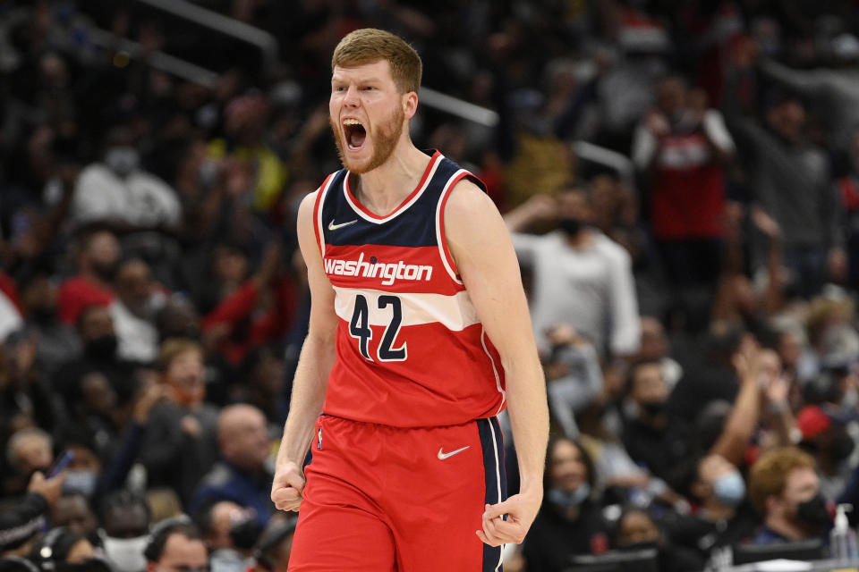 Washington Wizards forward Davis Bertans reacts after making a 3-point basket during the second half of the team's NBA basketball game against the Indiana Pacers, Friday, Oct. 22, 2021, in Washington. The Wizards won 135-134. (AP Photo/Nick Wass)