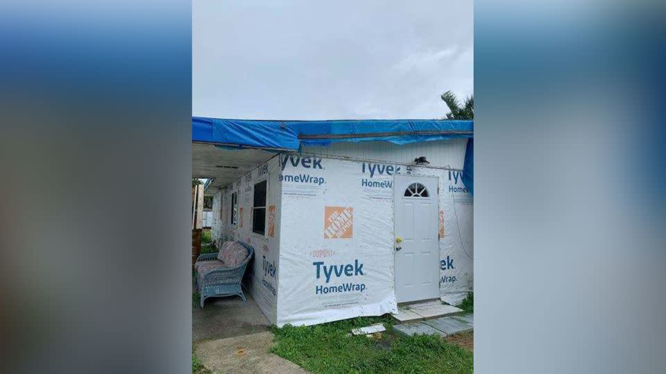 A blue tarp is a temporary roof for the Manns' house in St. James City. - Courtesy Bobby Mann