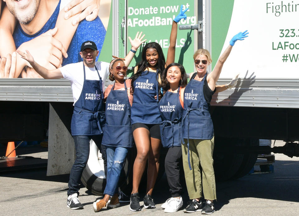<p>Paul Scheer, Shanola Hampton, Coco Jones, Annie Gonzalez and Julie Bowen volunteer at Hunger Action Day hosted by Feeding America, along with Los Angeles Regional Food Bank, at St. Ferdinand's Church in California on Sept. 23. </p>