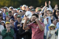 Jon Rahm, of Spain, celebrates on the 18th green after winning the Masters golf tournament at Augusta National Golf Club on Sunday, April 9, 2023, in Augusta, Ga. (AP Photo/Mark Baker)