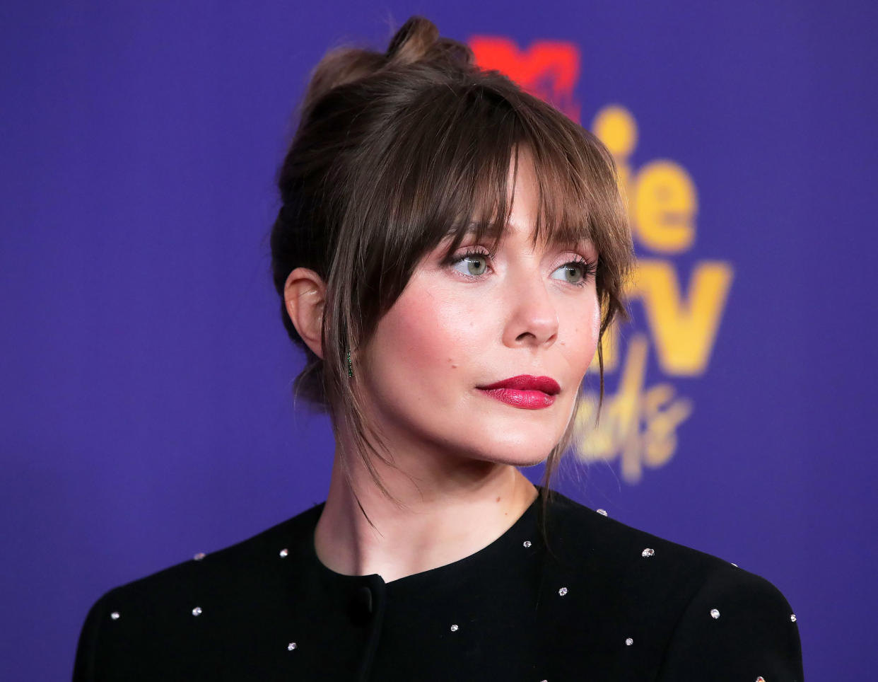 How Elizabeth Olsen Got Her Gorgeous Brunette ‘Do at the 2021 MTV Awards