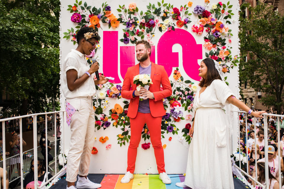 &ldquo;These three couples getting married, with tens of thousands of their &lsquo;chosen family&rsquo; of witnesses is beautiful," said Berk (with Shakarah Dean and Angelina Bowkett). (Photo: Kelly Balch)