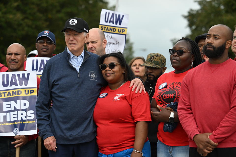 US President Joe Biden joins a picket line with members of the United Auto Workers (UAW) union at a General Motors Service Parts Operations plant in Belleville, Michigan, on September 26, 2023. Some 5,600 members of the UAW walked out of 38 US parts and distribution centers at General Motors and Stellantis at noon September 22, 2023, adding to last week's dramatic worker walkout. According to the White House, Biden is the first sitting president to join a picket line. (Photo by Jim WATSON / AFP) (Photo by JIM WATSON/AFP via Getty Images)