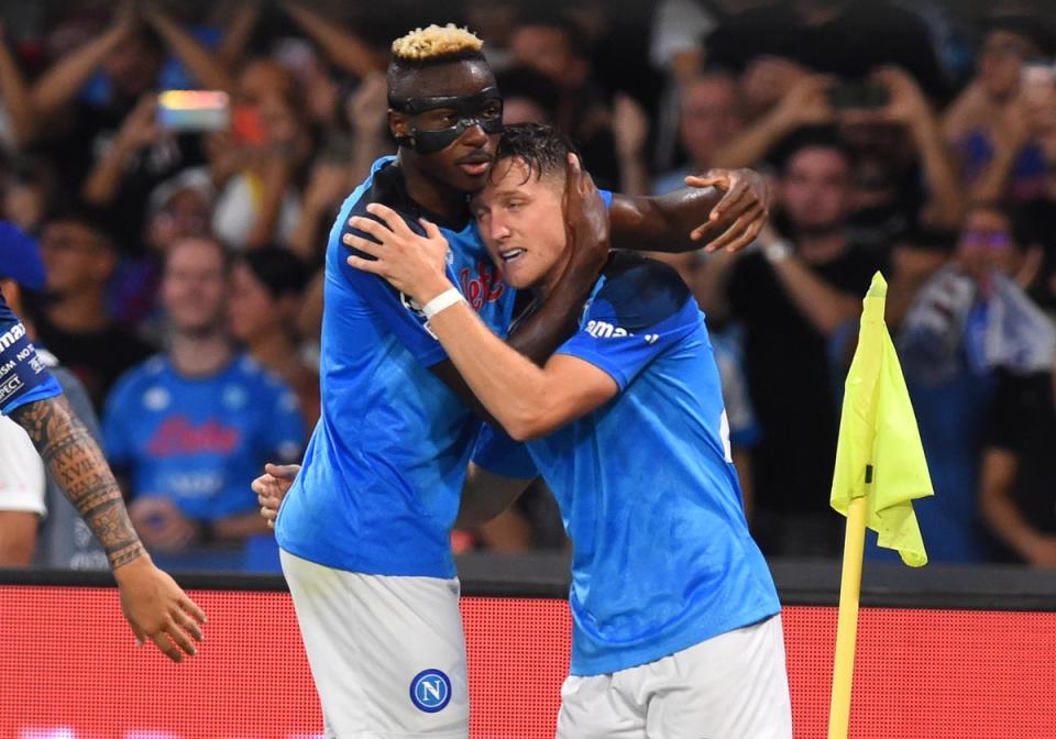 Napoli’s Piotr Zielinski (right) celebrates with Victor Osimhen (Agostino Gemito/PA) (PA Wire)