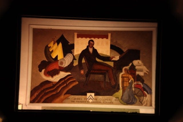 One of the murals inside Mamaroneck High School depicting the life of James Fenimore Cooper, who lived in Mamaroneck.