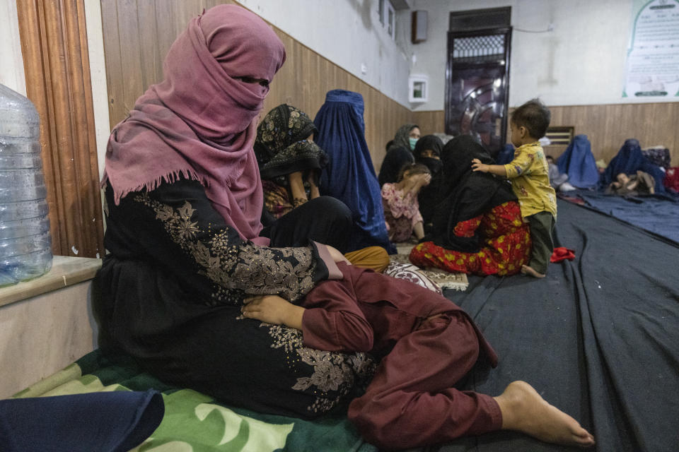 Displaced Afghan women and children from Kunduz are seen at a mosque that is sheltering them on August 13, 2021 in Kabul, Afghanistan.  Tensions are high as the Taliban advance on the capital city after taking Herat and the country's second-largest city Kandahar. (Photo by Paula Bronstein /Getty Images)