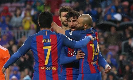 Football Soccer- Spanish La Liga Santander - Barcelona v Osasuna - Camp Nou stadium, Barcelona, Spain - 26/04/17 Barcelona's Andre Gomes celebrates a goal with team mates. REUTERS/Albert Gea