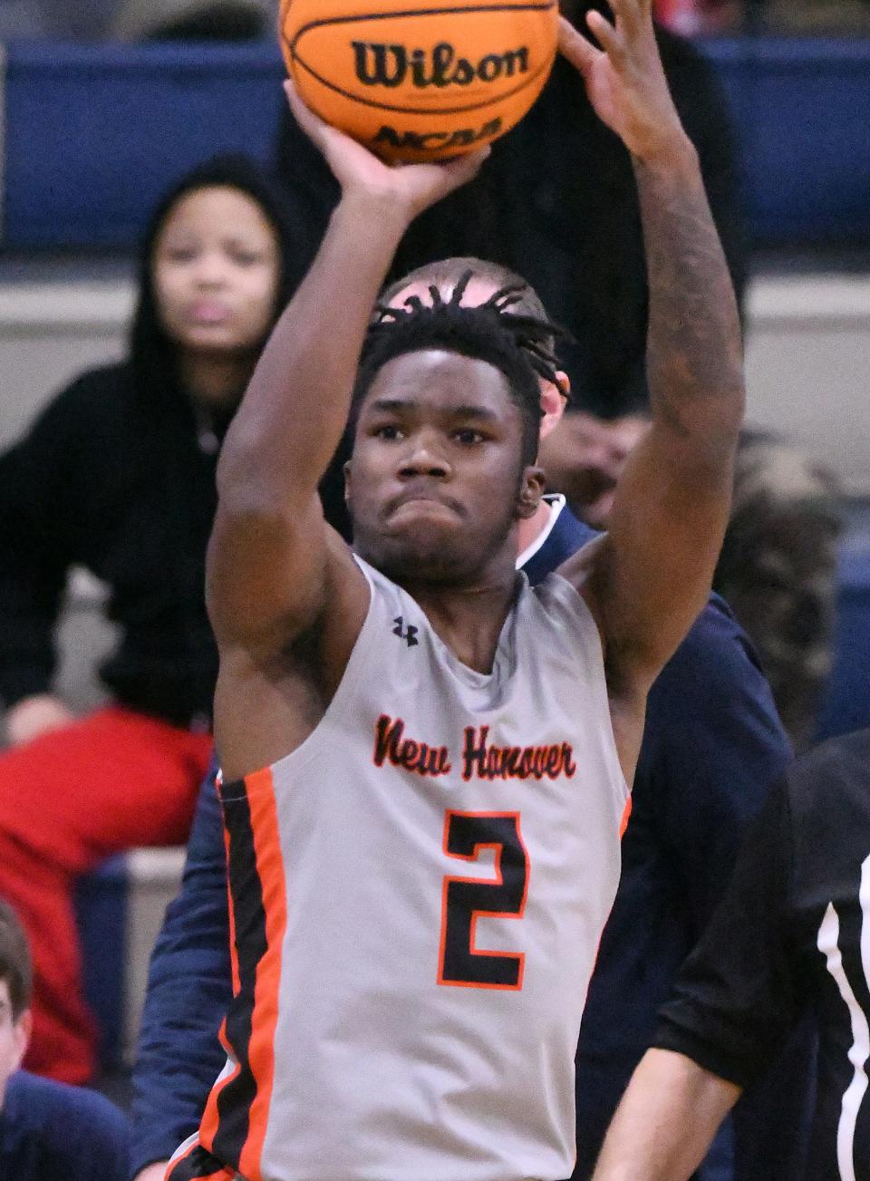 New Hanover's Zeus Batts puts up a shot against South Brunswick. Batts and the Wildcats are on track for a second undefeated regular season in three years.