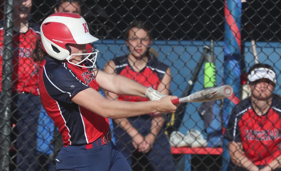RC Ketcham's Ava Gambichler (9) hits an rbi single against Carmel during softball action at Carmel High School May 10, 2022. Ketcham won the game 14-4.