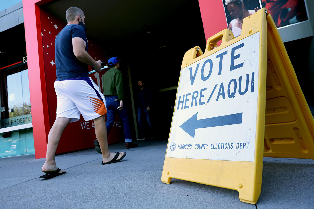 Voters arrive to cast their ballots at the Phoenix Art Museum on November 08, 2022 in Phoenix, Arizona. Kevin Dietsch/Getty Images