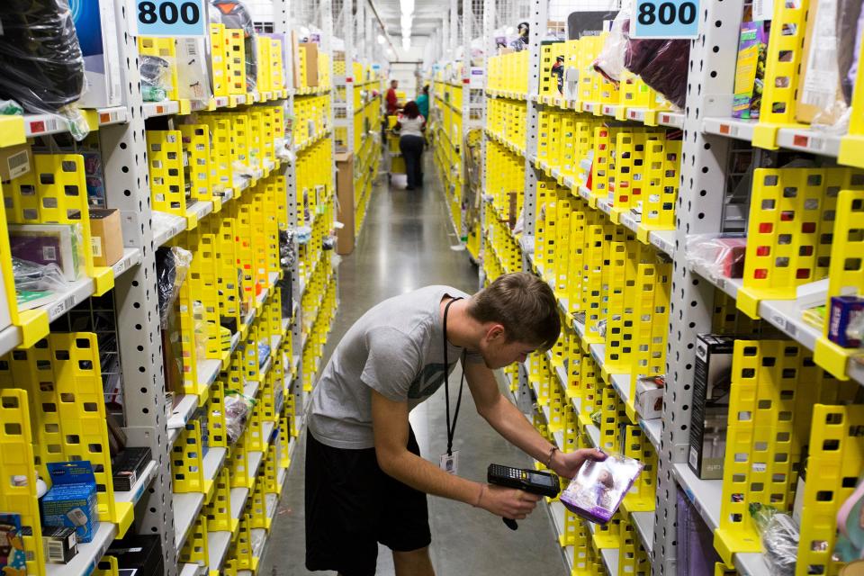 Amazon Associate Chris Webster works at the Amazon Fulfillment Center in Jeffersonville, IN ahead of Cyber Monday in 2020.