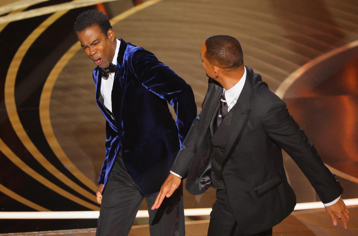 Will Smith hits Chris Rock on stage during the 94th Academy Awards on March 27, 2022.