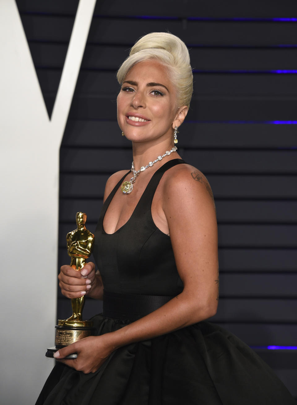 Lady Gaga, winner of the award for best song "Shallow," arrives at the Vanity Fair Oscar Party on Sunday, Feb. 24, 2019, in Beverly Hills, Calif. (Photo by Evan Agostini/Invision/AP)