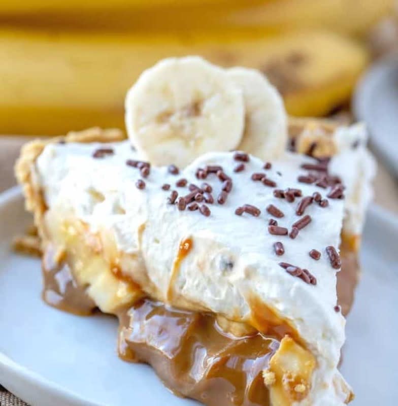 <p>The Country Cook</p><p>A creamy toffee filling is topped with bananas and whipped cream.</p><p><strong>Get the recipe: <a href="https://www.thecountrycook.net/easy-no-bake-banoffee-pie/" rel="nofollow noopener" target="_blank" data-ylk="slk:Best Banoffee Pie;elm:context_link;itc:0;sec:content-canvas" class="link rapid-noclick-resp">Best Banoffee Pie</a></strong></p>