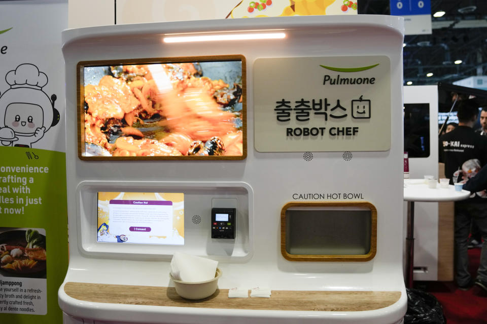 The Yo-Kai Express robot chef machine, made in partnership with Pulmone, is displayed during the CES tech show, Wednesday, Jan. 10, 2024, in Las Vegas. (AP Photo/Ryan Sun)