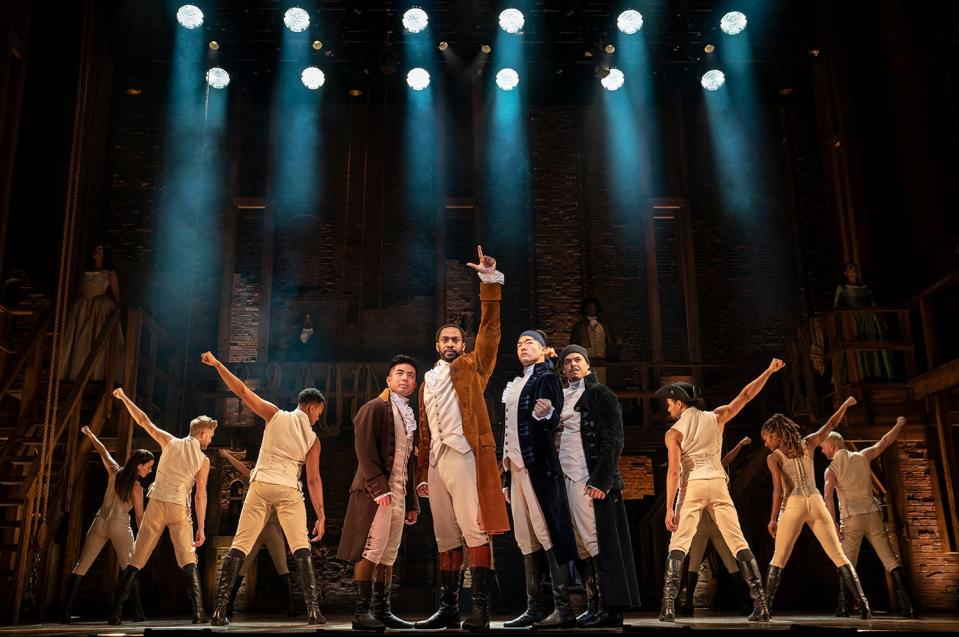 "Hamilton" cast members perform on a national tour.