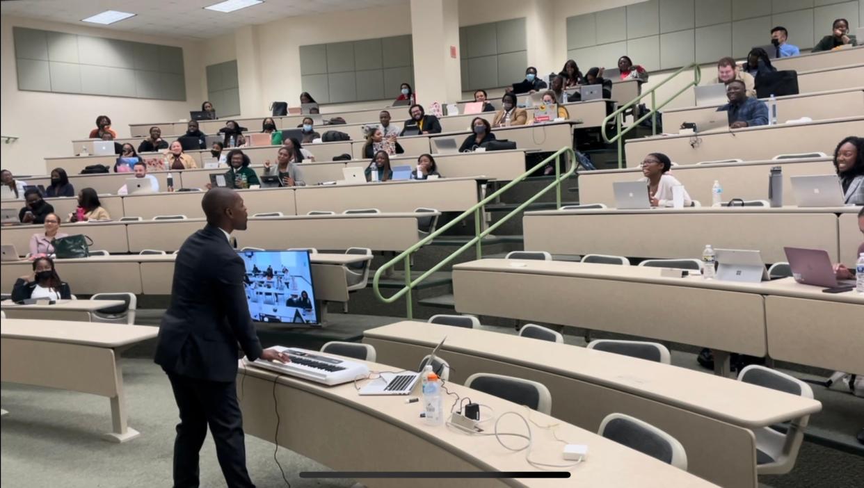Florida A&M University College of Pharmacy Professor Jamal Brown teaches his class on campus while singing and playing the keyboard on Tuesday, Jan. 17, 2023.