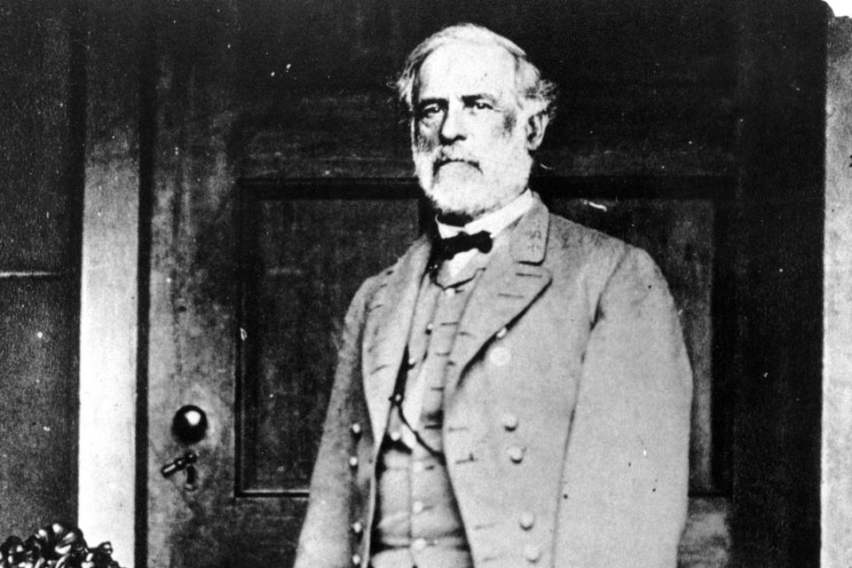 Gen. Robert E. Lee poses on the back porch of the Lee house in Richmond, Va., in 1865. Lee, who led the Confederate forces, surrendered his army at Appomattox Court House on April 9, 1865. (Photo: Mathew B. Brady/AP)