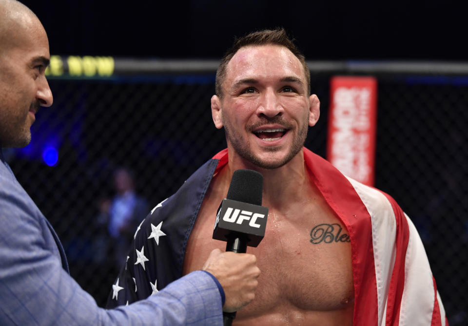 ABU DHABI, UNITED ARAB EMIRATES - JANUARY 23: Michael Chandler reacts after his knockout victory over Dan Hooker of New Zealand in a lightweight fight during the UFC 257 event inside Etihad Arena on UFC Fight Island on January 23, 2021 in Abu Dhabi, United Arab Emirates. (Photo by Jeff Bottari/Zuffa LLC)