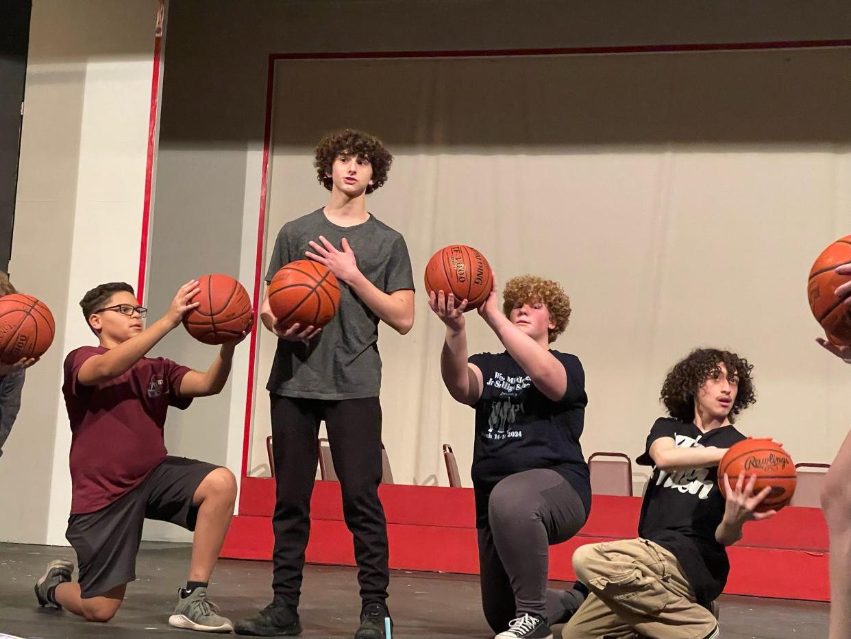 Young actors practice performing 'High School Musical' for the New Castle Playhouse stage.