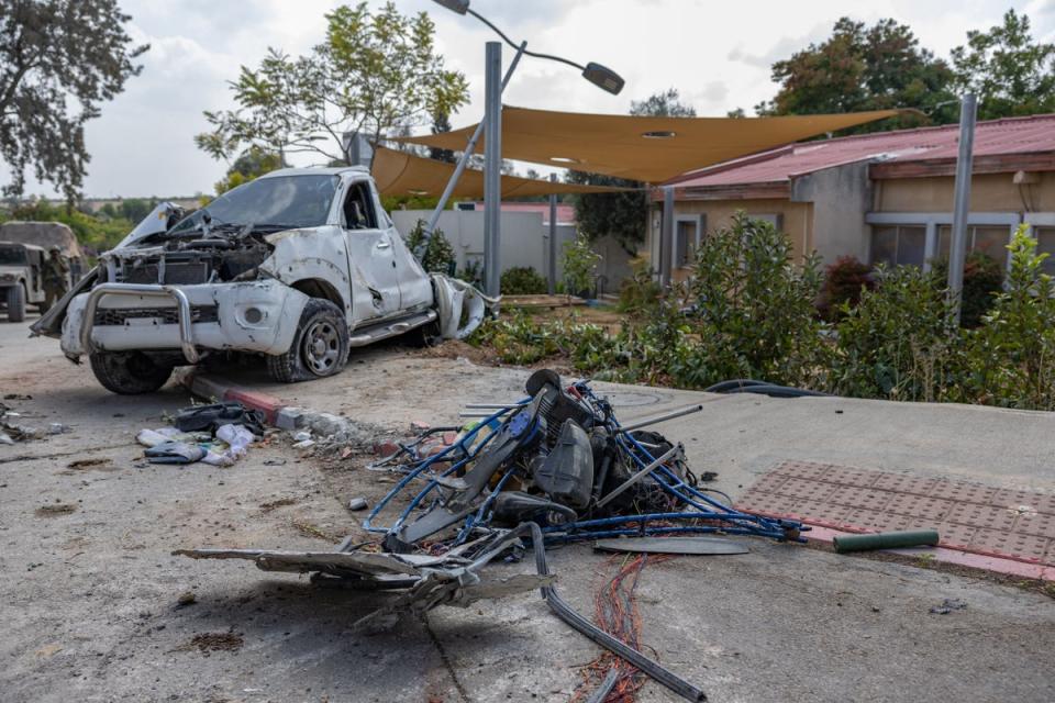 The aftermath of the Hamas attack on Kfar Aza (Bel Trew/The Independent)