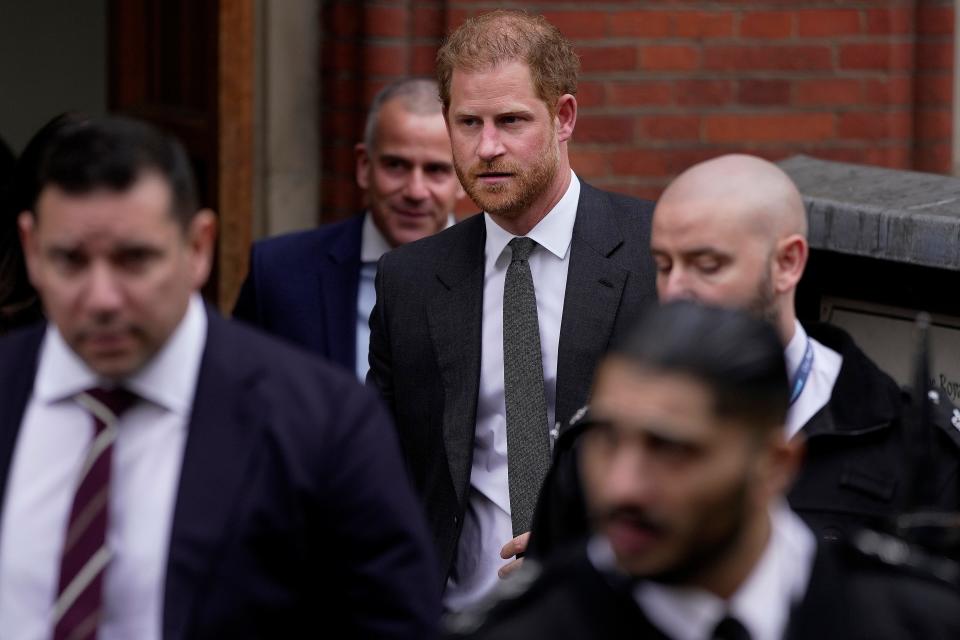 Britain's Prince Harry leaves the Royal Courts Of Justice in London, Tuesday, March 28, 2023. Prince Harry was in a London court on Tuesday as the lawyer for a group of British tabloids prepared to ask a judge to toss out lawsuits by the prince, Elton John and several other celebrities who allege phone tapping and other invasions of privacy.(AP Photo/Kin Cheung)